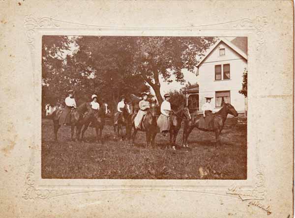 Esta Simpson with 4 women on horseback