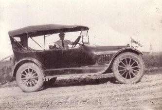 Fred Schrader in his Essex car